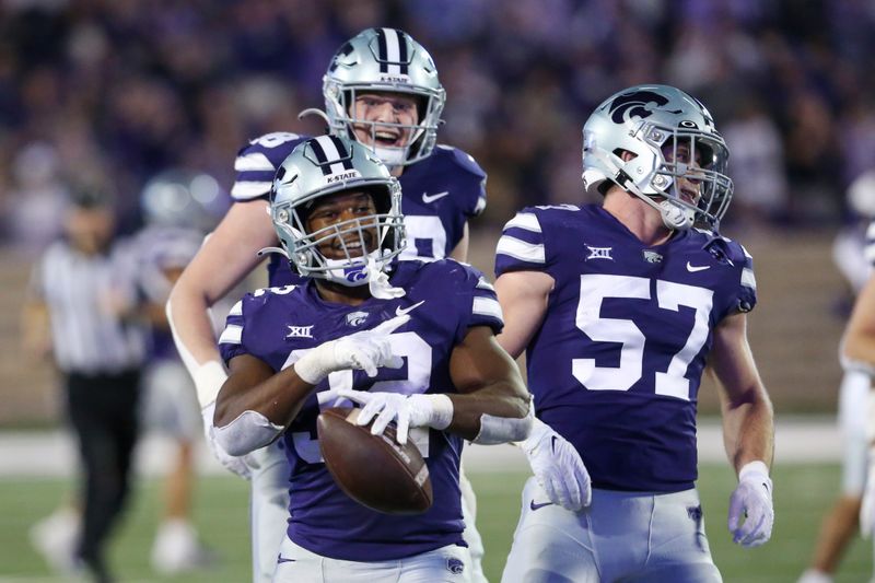 Oct 21, 2023; Manhattan, Kansas, USA; Kansas State Wildcats linebacker Desmond Purnell (32) celebrate an interception in the third quarter against the TCU Horned Frogs at Bill Snyder Family Football Stadium. Mandatory Credit: Scott Sewell-USA TODAY Sports