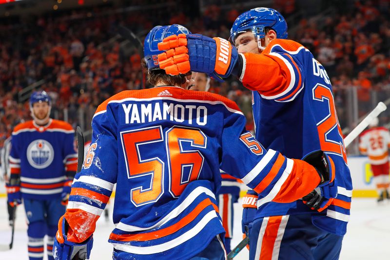 Sep 30, 2022; Edmonton, Alberta, CAN; The Edmonton Oilers celebrate a goal by forward Kailer Yamamoto (56) against the Calgary Flames  at Rogers Place. Mandatory Credit: Perry Nelson-USA TODAY Sports