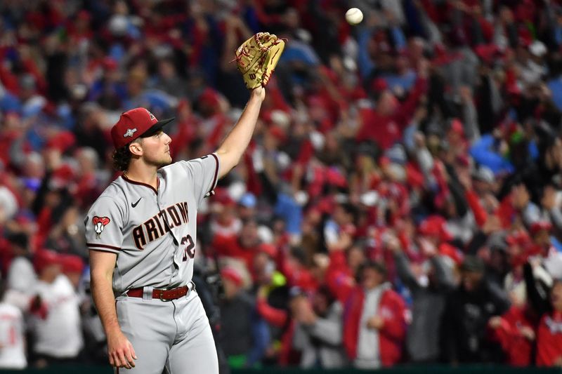 Oct 24, 2023; Philadelphia, Pennsylvania, USA; Arizona Diamondbacks starting pitcher Brandon Pfaadt (32) reacts after giving up a home run against the Philadelphia Phillies in the second inning during game seven of the NLCS for the 2023 MLB playoffs at Citizens Bank Park. Mandatory Credit: Eric Hartline-USA TODAY Sports