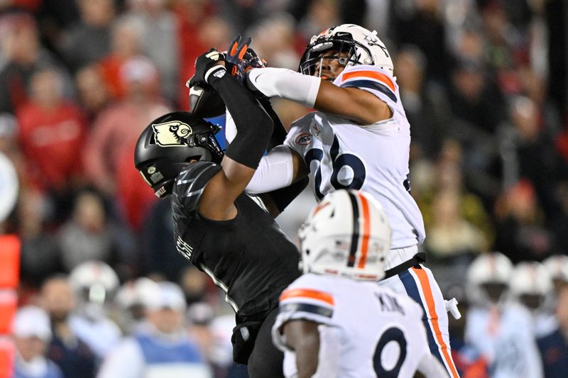 Nov 9, 2023; Louisville, Kentucky, USA; Virginia Cavaliers safety Caleb Hardy (26) breaks up a pass intended for Louisville Cardinals wide receiver Jamari Thrash (1) during the first half at L&N Federal Credit Union Stadium. Mandatory Credit: Jamie Rhodes-USA TODAY Sports