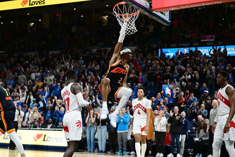 OKLAHOMA CITY, OKLAHOMA - FEBRUARY 4: Shai Gilgeous-Alexander #2 of the Oklahoma City Thunder hangs from the rim after a dunk during the second overtime against the Toronto Raptors at Paycom Center on February 4, 2024 in Oklahoma City, Oklahoma. NOTE TO USER: User expressly acknowledges and agrees that, by downloading and or using this Photograph, user is consenting to the terms and conditions of the Getty Images License Agreement. (Photo by Joshua Gateley/Getty Images)