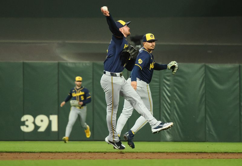 Sep 12, 2024; San Francisco, California, USA; Milwaukee Brewers second baseman Brice Turang (2) throws the ball for an out against the San Francisco Giants during the sixth inning at Oracle Park. Mandatory Credit: Kelley L Cox-Imagn Images