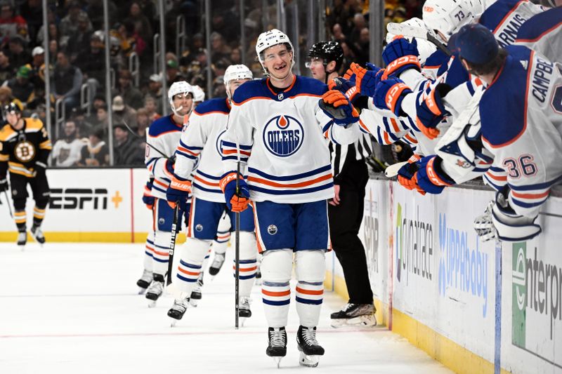 Mar 9, 2023; Boston, Massachusetts, USA; Edmonton Oilers center Ryan McLeod (71) celebrates with his teammates after scoring against the Boston Bruins during the third period at the TD Garden. Mandatory Credit: Brian Fluharty-USA TODAY Sports