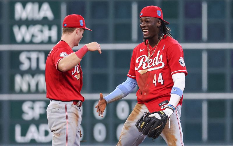 Jun 18, 2023; Houston, Texas, USA; Cincinnati Reds shortstop Elly De La Cruz (44) celebrates with designated hitter Matt McLain (9) after the game against the Houston Astros at Minute Maid Park. Mandatory Credit: Troy Taormina-USA TODAY Sports