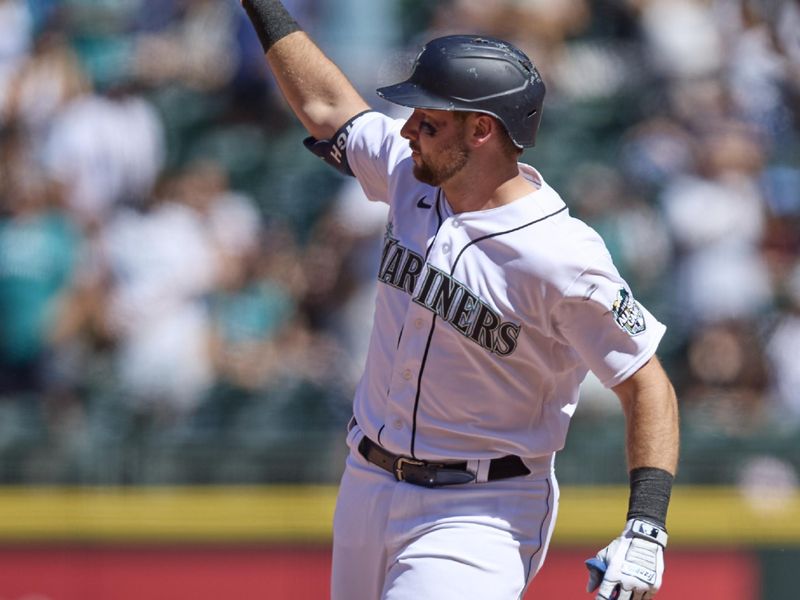 Aug 2, 2023; Seattle, Washington, USA; Seattle Mariners player Cal Raleigh rounds the bases after hitting a two-run home run during the sixth inning against the Boston Red Sox at T-Mobile Park. Mandatory Credit: John Froschauer-USA TODAY Sports