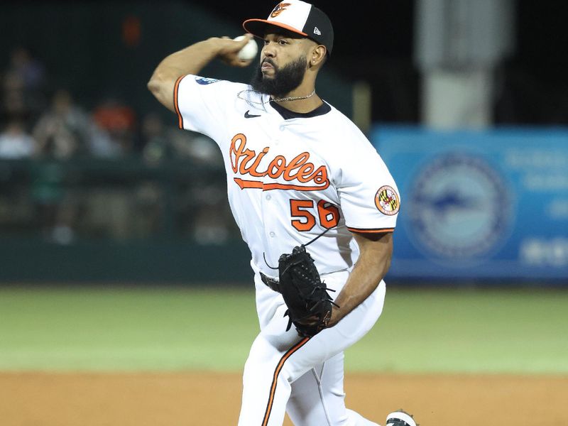 Mar 20, 2025; Sarasota, Florida, USA;  Baltimore Orioles pitcher Seranthony Dominguez (56) throws a pitch during the sixth inning against the New York Yankees at Ed Smith Stadium. Mandatory Credit: Kim Klement Neitzel-Imagn Images