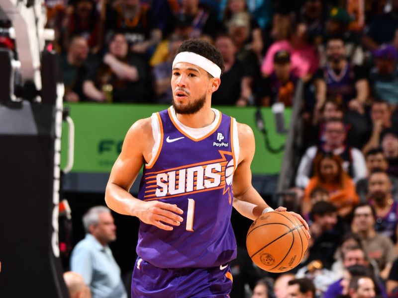 PHOENIX, AZ - MARCH 21:  Devin Booker #1 of the Phoenix Suns handles the ball during the game  on March 21, 2024 at Footprint Center in Phoenix, Arizona. NOTE TO USER: User expressly acknowledges and agrees that, by downloading and or using this photograph, user is consenting to the terms and conditions of the Getty Images License Agreement. Mandatory Copyright Notice: Copyright 2024 NBAE (Photo by Barry Gossage/NBAE via Getty Images)