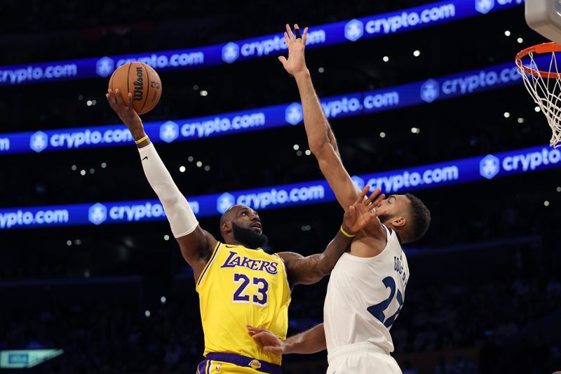 LOS ANGELES, CALIFORNIA - OCTOBER 22: LeBron James #23 of the Los Angeles Lakers takes a shot over Rudy Gobert #27 of the Minnesota Timberwolves during the first quarter at Crypto.com Arena on October 22, 2024 in Los Angeles, California. (Photo by Harry How/Getty Images)