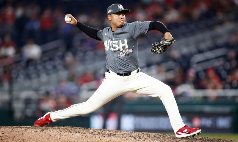 Sep 13, 2024; Washington, District of Columbia, USA; Washington Nationals pitcher Eduardo Salazar (62) delivers a throw during the sixth inning against the Miami Marlins at Nationals Park. Mandatory Credit: Daniel Kucin Jr.-Imagn Images

