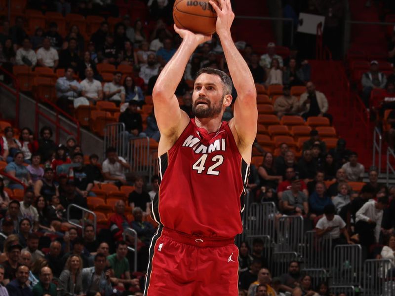 MIAMI, FL - MARCH 3: Kevin Love #42 of the Miami Heat shoots a three point basket during the game against the Washington Wizards on March 3, 2025 at Kaseya Center in Miami, Florida. NOTE TO USER: User expressly acknowledges and agrees that, by downloading and or using this Photograph, user is consenting to the terms and conditions of the Getty Images License Agreement. Mandatory Copyright Notice: Copyright 2025 NBAE (Photo by Issac Baldizon/NBAE via Getty Images)
