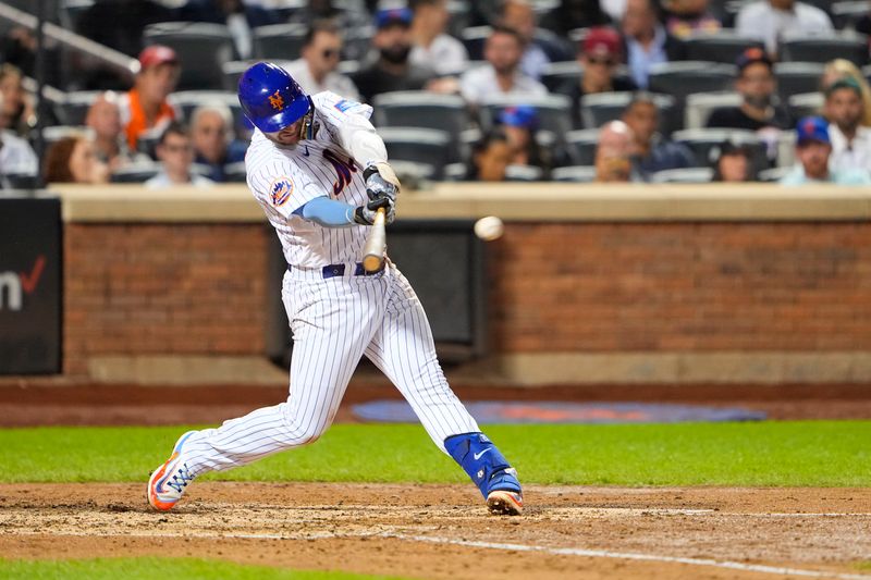 Sep 13, 2023; New York City, New York, USA; New York Mets first baseman Pete Alonso (20) hits an RBI single against the Arizona Diamondbacks during the fifth inning at Citi Field. Mandatory Credit: Gregory Fisher-USA TODAY Sports