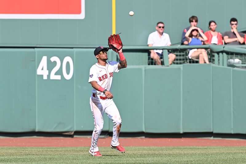 Aug 11, 2024; Boston, Massachusetts, USA; Boston Red Sox center fielder Ceddanne Rafaela (43) makes a catch for an out against the Houston Astros during the ninth inning at Fenway Park. Mandatory Credit: Eric Canha-USA TODAY Sports