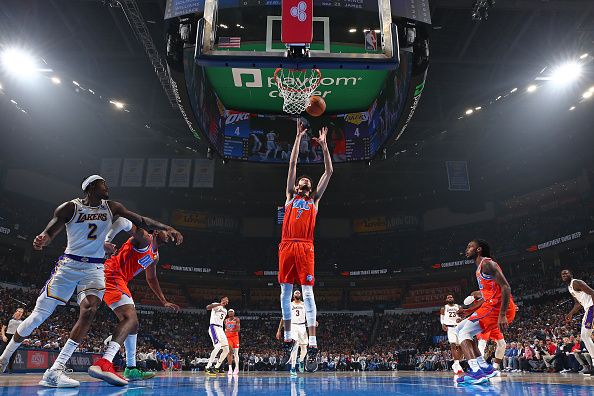 OKLAHOMA CITY, OK - DECEMBER 23: Chet Holmgren #7 of the Oklahoma City Thunder rebounds during the game against the Los Angeles Lakers on December 23, 2023 at Paycom Arena in Oklahoma City, Oklahoma. NOTE TO USER: User expressly acknowledges and agrees that, by downloading and or using this photograph, User is consenting to the terms and conditions of the Getty Images License Agreement. Mandatory Copyright Notice: Copyright 2023 NBAE (Photo by Zach Beeker/NBAE via Getty Images)