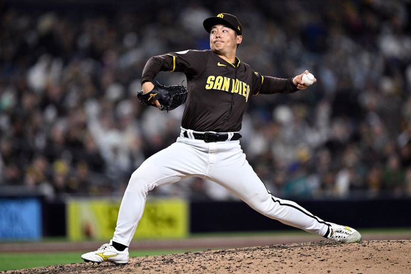 Mar 25, 2024; San Diego, California, USA; San Diego Padres relief pitcher Yuki Matsui (1) throws a pitch against the Seattle Mariners during the eighth inning at Petco Park. Mandatory Credit: Orlando Ramirez-USA TODAY Sports