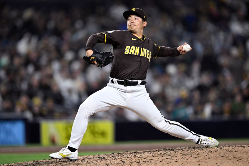 Mar 25, 2024; San Diego, California, USA; San Diego Padres relief pitcher Yuki Matsui (1) throws a pitch against the Seattle Mariners during the eighth inning at Petco Park. Mandatory Credit: Orlando Ramirez-USA TODAY Sports