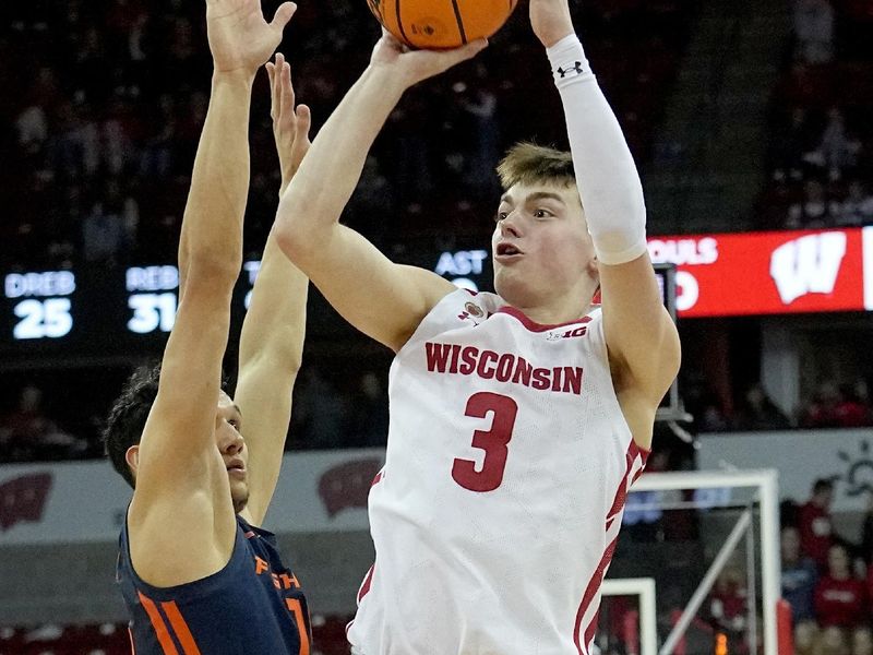 Jan 1, 2023; Madison, Wis, USA; Wisconsin guard Connor Essegian (3) hoots over Illinois guard RJ Melendez (15) during the second half of their game at the Kohl Center. Mandatory Credit: Mark Hoffman/Milwaukee Journal Sentinel via USA TODAY NETWORK