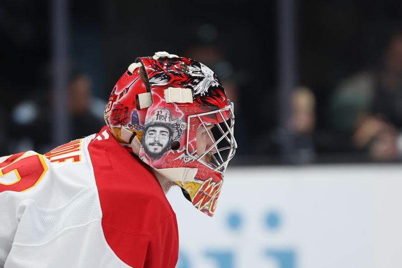 Oct 30, 2024; Salt Lake City, Utah, USA; A general view of the helmet worn by Calgary Flames goaltender Dustin Wolf (32) against the Utah Hockey Club during the third period at Delta Center. Mandatory Credit: Rob Gray-Imagn Images