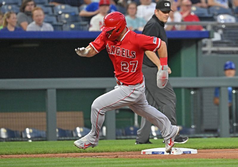 Jun 16, 2023; Kansas City, Missouri, USA; Los Angeles Angels center fielder Mike Trout (27) rounds third to score a run in the sixth inning against the Kansas City Royals at Kauffman Stadium. Mandatory Credit: Peter Aiken-USA TODAY Sports