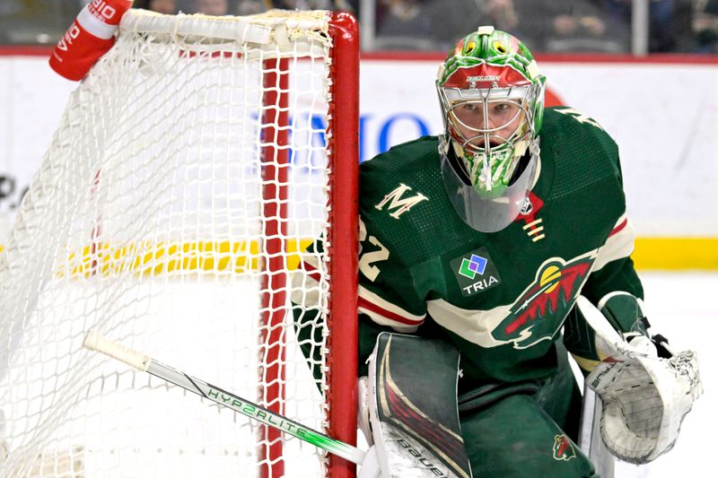 Jan 25, 2024; Saint Paul, Minnesota, USA; Minnesota Wild goalie Filip Gustavsson (32) watches play against the Nashville Predators during the first period at Xcel Energy Center. Mandatory Credit: Nick Wosika-USA TODAY Sports