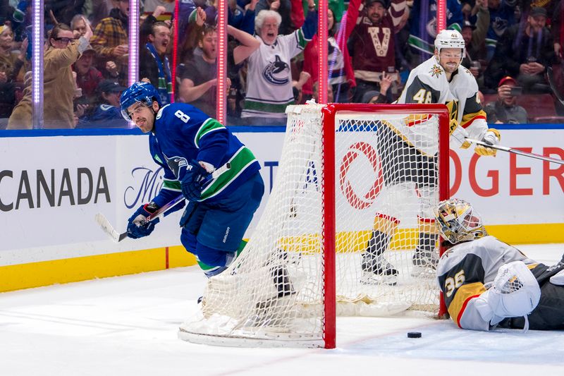 Apr 8, 2024; Vancouver, British Columbia, CAN; Vegas Golden Knights forward Tomas Hertl (48) watches as Vancouver Canucks forward Conor Garland (8) scores on goalie Logan Thompson (36) in the first period  at Rogers Arena. Mandatory Credit: Bob Frid-USA TODAY Sports