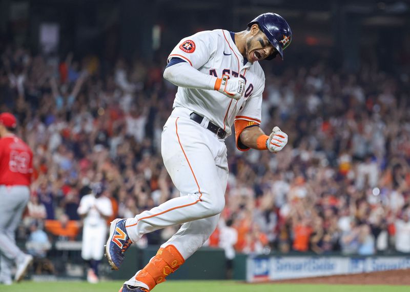 May 21, 2024; Houston, Texas, USA; Houston Astros shortstop Jeremy Pena (3) reacts after hitting a walk-off RBI single during the tenth inning against the Los Angeles Angels at Minute Maid Park. Mandatory Credit: Troy Taormina-USA TODAY Sports