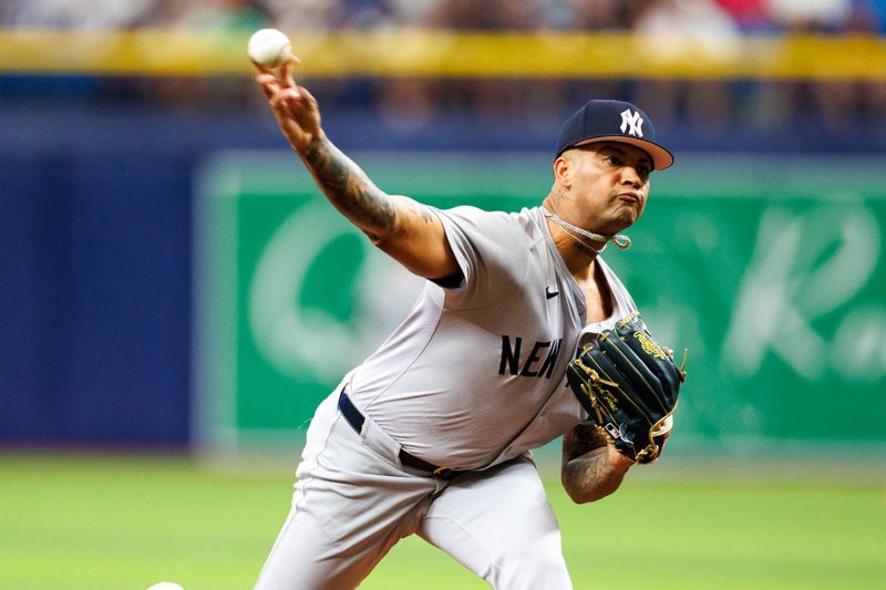 May 12, 2024; St. Petersburg, Florida, USA;  New York Yankees pitcher Luis Gil (81) throws a pitch against the Tampa Bay Rays in the first inning at Tropicana Field. Mandatory Credit: Nathan Ray Seebeck-USA TODAY Sports