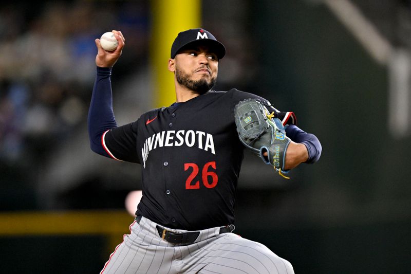 Sep 24, 2025; Arlington, Texas, USA; Minnesota Twins starting pitcher Taj Bradley (26) throws the ball during the third inning against the Texas Rangers at Globe Life Field. Mandatory Credit: Jerome Miron-Imagn Images