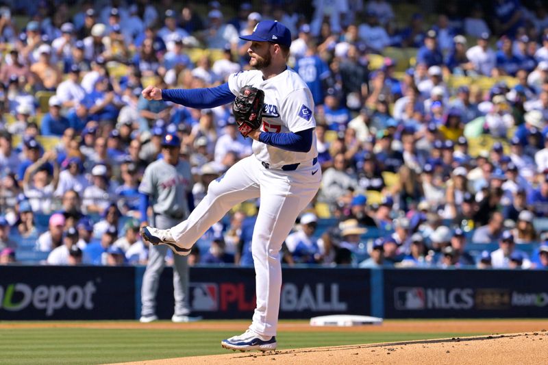 Oct 14, 2024; Los Angeles, California, USA; Los Angeles Dodgers pitcher Ryan Brasier (57) pitches in the first inning against the New York Mets during game two of the NLCS for the 2024 MLB Playoffs at Dodger Stadium. Mandatory Credit: Jayne Kamin-Oncea-Imagn Images