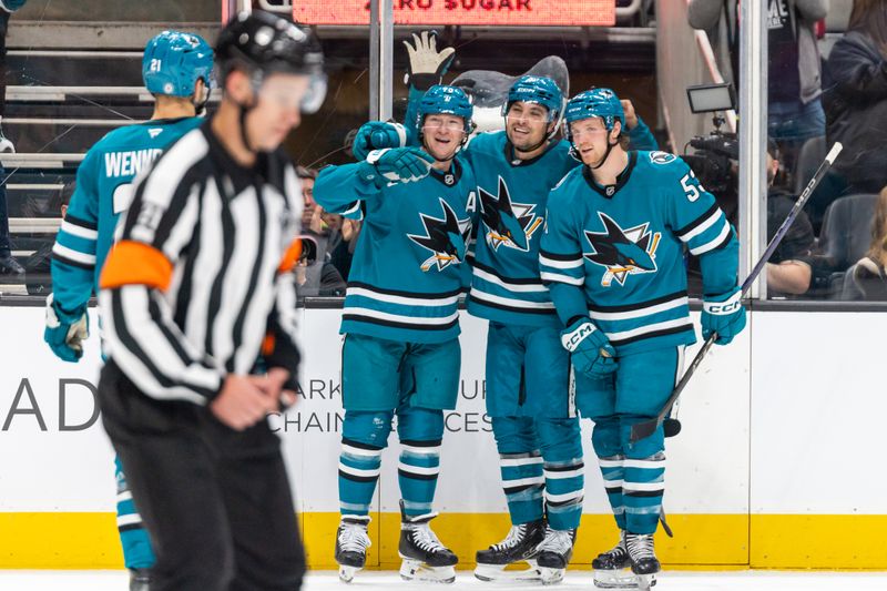 Nov 18, 2024; San Jose, California, USA; San Jose Sharks celebrate a goal during the second period against the Detroit Red Wings at SAP Center at San Jose. Mandatory Credit: Bob Kupbens-Imagn Images