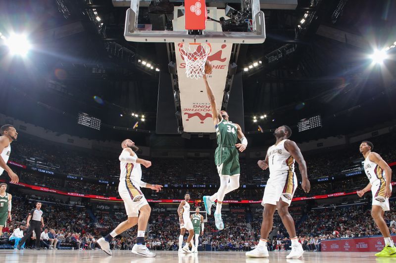 NEW ORLEANS, LA - MARCH 28: Giannis Antetokounmpo #34 of the Milwaukee Bucks goes to the basket during the game on March 28, 2024 at the Smoothie King Center in New Orleans, Louisiana. NOTE TO USER: User expressly acknowledges and agrees that, by downloading and or using this Photograph, user is consenting to the terms and conditions of the Getty Images License Agreement. Mandatory Copyright Notice: Copyright 2024 NBAE (Photo by Layne Murdoch Jr./NBAE via Getty Images)