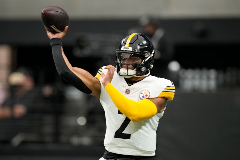 Pittsburgh Steelers quarterback Justin Fields (2) warms up before an NFL football game against the Las Vegas Raiders in Las Vegas, Sunday, Oct. 13, 2024. (AP Photo/John Locher)