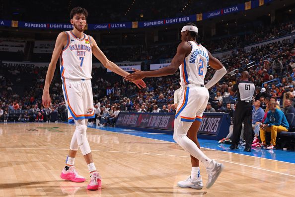 OKLAHOMA CITY, OK - NOVEMBER 1:  Chet Holmgren #7 and Shai Gilgeous-Alexander #2 of the Oklahoma City Thunder celebrate during the game against the New Orleans Pelicans on November 1, 2023 at Paycom Arena in Oklahoma City, Oklahoma. NOTE TO USER: User expressly acknowledges and agrees that, by downloading and or using this photograph, User is consenting to the terms and conditions of the Getty Images License Agreement. Mandatory Copyright Notice: Copyright 2023 NBAE (Photo by Zach Beeker/NBAE via Getty Images)