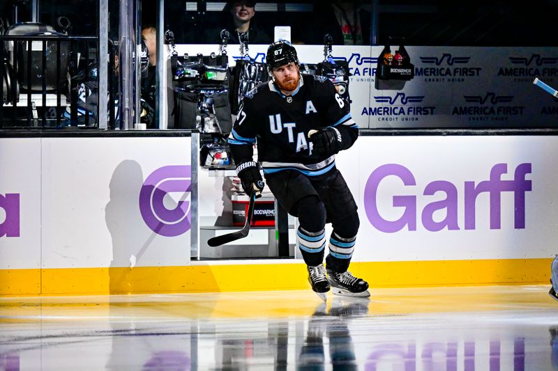 Jan 18, 2025; Salt Lake City, Utah, USA; Utah Hockey Club left wing Lawson Crouse (67) skates on the ice against the St. Louis Blues during first period at the Delta Center. Mandatory Credit: Christopher Creveling-Imagn Images