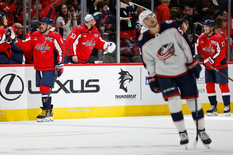 Sep 27, 2024; Washington, District of Columbia, USA; Washington Capitals center Dylan Strome (17) celebrates with teammates after scoring a goal against the Columbus Blue Jackets in the second period at Capital One Arena. Mandatory Credit: Geoff Burke-Imagn Images