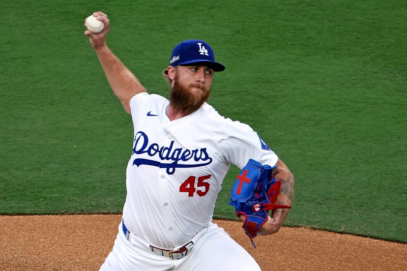 Oct 20, 2024; Los Angeles, California, USA; Los Angeles Dodgers pitcher Michael Kopech (45) pitches during the first inning against the New York Mets during game six of the NLCS for the 2024 MLB playoffs at Dodger Stadium. Mandatory Credit: Kiyoshi Mio-Imagn Images