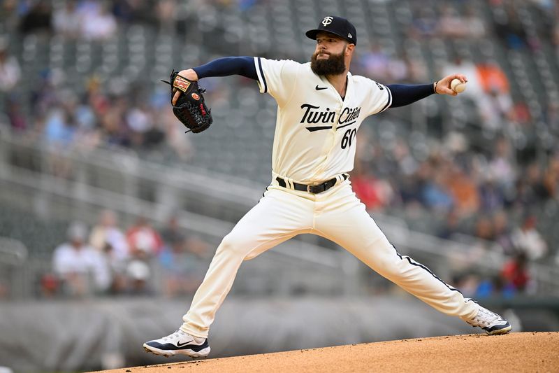 Aug 6, 2023; Minneapolis, Minnesota, USA; Minnesota Twins pitcher Dallas Keuchel (60) delivers a pitch against the Arizona Diamondbacks during the first inning at Target Field. Mandatory Credit: Nick Wosika-USA TODAY Sports