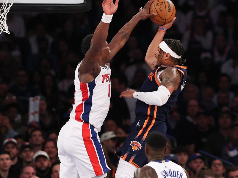 NEW YORK, NEW YORK - APRIL 21: Miles McBride #2 of the New York Knicks takes a shot over Jalen Duren #0 of the Detroit Pistons during the second quarter in Game Two of the Eastern Conference First Round NBA Playoffs at Madison Square Garden on April 21, 2025 in New York City. NOTE TO USER: User expressly acknowledges and agrees that, by downloading and or using this photograph, User is consenting to the terms and conditions of the Getty Images License Agreement. (Photo by Al Bello/Getty Images)