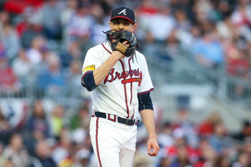 Apr 6, 2024; Atlanta, Georgia, USA; Atlanta Braves starting pitcher Max Fried (54) reacts against the Arizona Diamondbacks in the first inning at Truist Park. Mandatory Credit: Brett Davis-USA TODAY Sports