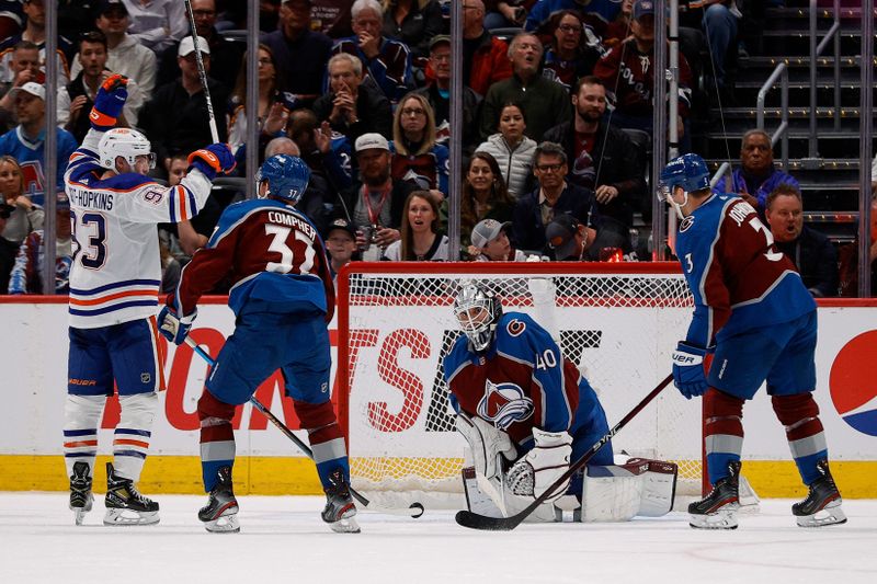 Apr 11, 2023; Denver, Colorado, USA; Edmonton Oilers center Ryan Nugent-Hopkins (93) celebrates the goal of defenseman Evan Bouchard (2) as Colorado Avalanche left wing J.T. Compher (37) and goaltender Alexandar Georgiev (40) and defenseman Jack Johnson (3) react in overtime at Ball Arena. Mandatory Credit: Isaiah J. Downing-USA TODAY Sports