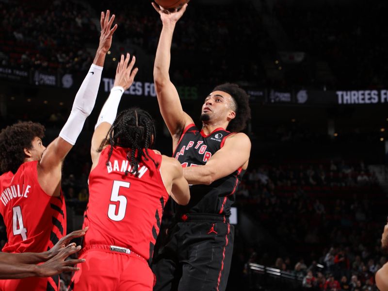 PORTLAND, OR - MARCH 9: Jordan Nwora #13 of the Toronto Raptors drives to the basket during the game against the Portland Trail Blazers on March 9, 2024 at the Moda Center Arena in Portland, Oregon. NOTE TO USER: User expressly acknowledges and agrees that, by downloading and or using this photograph, user is consenting to the terms and conditions of the Getty Images License Agreement. Mandatory Copyright Notice: Copyright 2024 NBAE (Photo by Cameron Browne/NBAE via Getty Images)