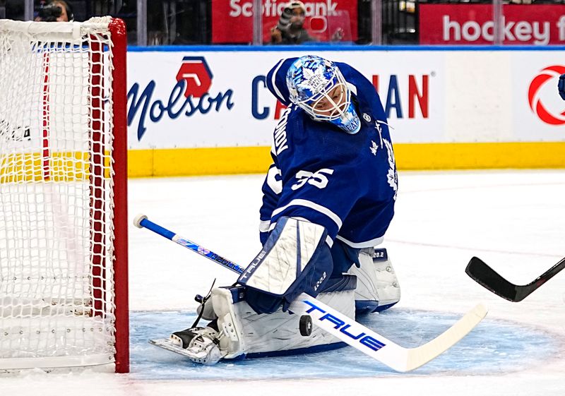 Sep 24, 2022; Toronto, Ontario, CAN; Toronto Maple Leafs goaltender Ilya Samsonov (35) makes a save against the Ottawa Senators during the first period at Scotiabank Arena. Mandatory Credit: John E. Sokolowski-USA TODAY Sports