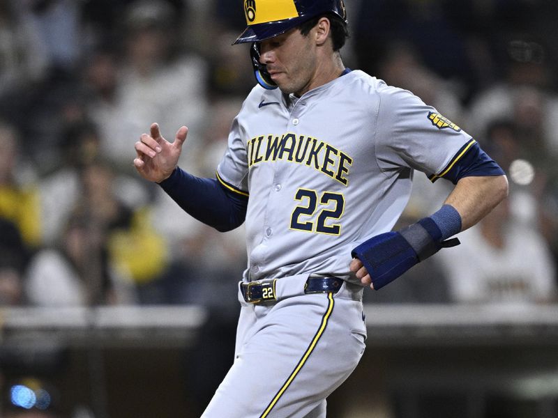 Jun 20, 2024; San Diego, California, USA; Milwaukee Brewers left fielder Christian Yelich (22) scores a run against the San Diego Padres during the ninth inning at Petco Park. Mandatory Credit: Orlando Ramirez-USA TODAY Sports