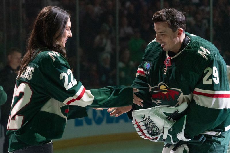 Apr 18, 2024; Saint Paul, Minnesota, USA; Minnesota Wild goaltender Marc-Andre Fleury (29) is awarded the Tom Kurvers Humanitarian Award before their game against the Seattle Kraken in the first period at Xcel Energy Center. Mandatory Credit: Matt Blewett-USA TODAY Sports