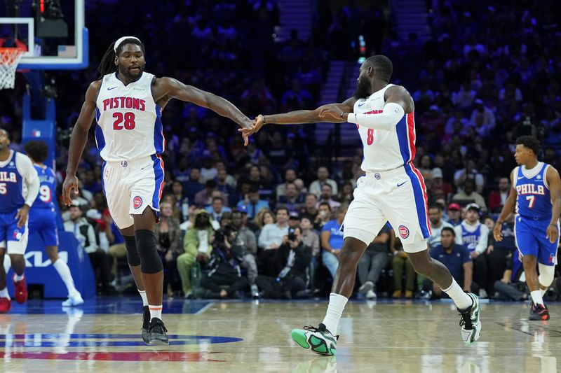 PHILADELPHIA, PENNSYLVANIA - OCTOBER 30: Isaiah Stewart #28 of the Detroit Pistons celebrates with Tim Hardaway Jr. #8 against the Philadelphia 76ers  in the first half at the Wells Fargo Center on October 30, 2024 in Philadelphia, Pennsylvania. NOTE TO USER: User expressly acknowledges and agrees that, by downloading and/or using this photograph, user is consenting to the terms and conditions of the Getty Images License Agreement. (Photo by Mitchell Leff/Getty Images)