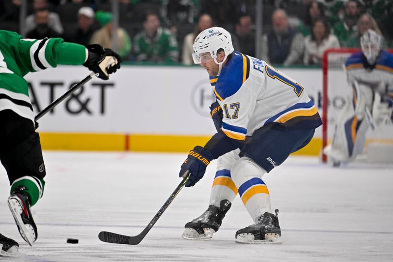 Dec 14, 2024; Dallas, Texas, USA; St. Louis Blues defenseman Cam Fowler (17) skates against the Dallas Stars during the first period at American Airlines Center. Mandatory Credit: Jerome Miron-Imagn Images