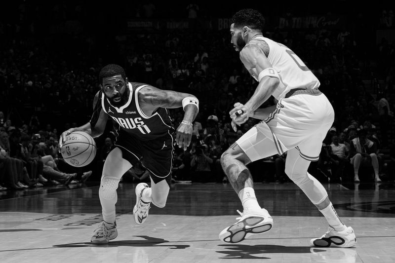 DALLAS, TX - JUNE 14: (EDITORS NOTE: this photo has been converted to black and white)Kyrie Irving #11 of the Dallas Mavericks dribbles the ball during the game against the Boston Celtics during Game 4 of the 2024 NBA Finals on June 14, 2024 at the American Airlines Center in Dallas, Texas. NOTE TO USER: User expressly acknowledges and agrees that, by downloading and or using this photograph, User is consenting to the terms and conditions of the Getty Images License Agreement. Mandatory Copyright Notice: Copyright 2024 NBAE (Photo by Jesse D. Garrabrant/NBAE via Getty Images)