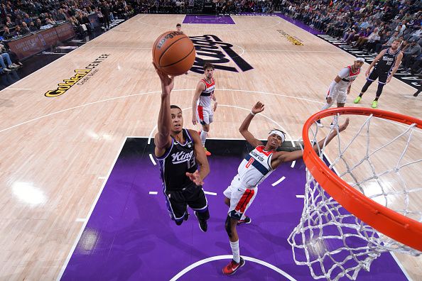 SACRAMENTO, CA - DECEMBER 18: Keegan Murray #13 of the Sacramento Kings drives to the basket during the game against the Washington Wizards on December 18, 2023 at Golden 1 Center in Sacramento, California. NOTE TO USER: User expressly acknowledges and agrees that, by downloading and or using this Photograph, user is consenting to the terms and conditions of the Getty Images License Agreement. Mandatory Copyright Notice: Copyright 2023 NBAE (Photo by Rocky Widner/NBAE via Getty Images)