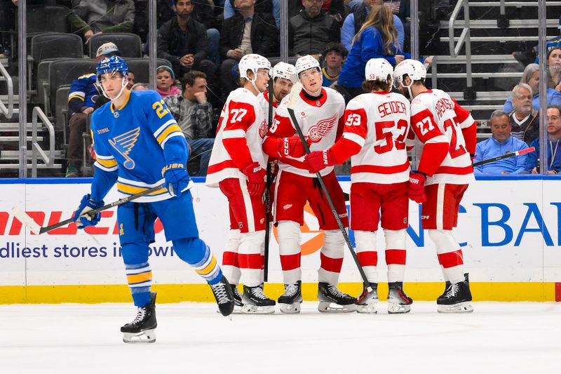 Oct 28, 2025; St. Louis, Missouri, USA; Detroit Red Wings left wing Elmer Soderblom (85) is congratulated by teammates after scoring against the St. Louis Blues during the second period at Enterprise Center. Mandatory Credit: Jeff Curry-Imagn Images