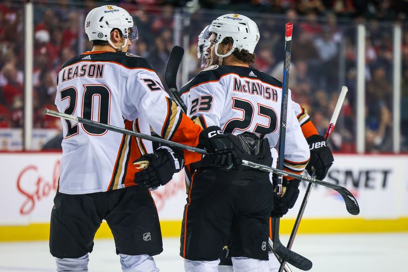 Apr 2, 2024; Calgary, Alberta, CAN; Anaheim Ducks center Mason McTavish (23) celebrates his goal with teammates against the Calgary Flames during the first period at Scotiabank Saddledome. Mandatory Credit: Sergei Belski-USA TODAY Sports