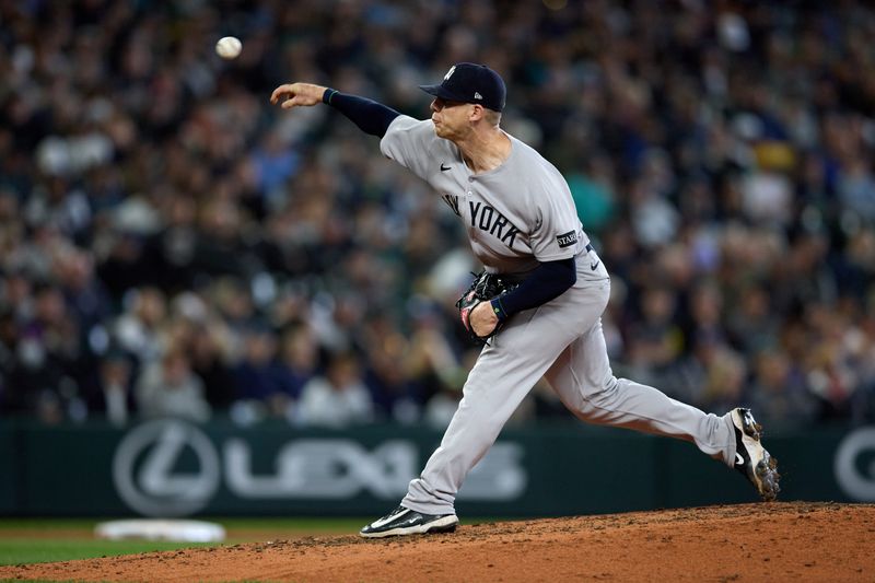 May 14, 2025; Seattle, Washington, USA; New York Yankees pitcher Ian Hamilton (71) throws a pitch against the Seattle Mariners during the seventh inning at T-Mobile Park. Mandatory Credit: John Froschauer-Imagn Images